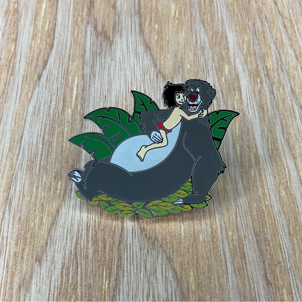 The Jungle Book Mowgli and Baloo Hugging on Leaf Disney Pin